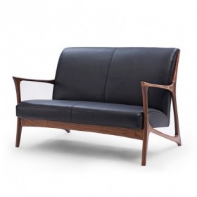 Two seater sofa with leather cushion